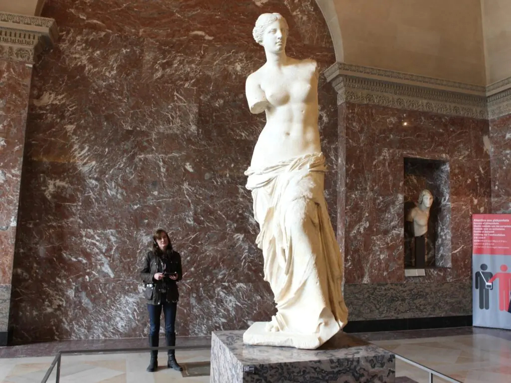 The Venus de Milo in the Louvre galleries.